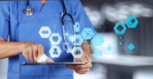 Medicine doctor's hand working with modern computer interface.