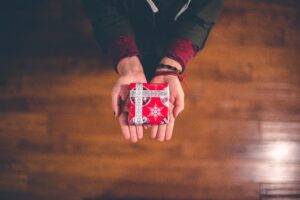 hands holding out a gift