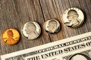 US money over wooden background