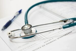 Stethoscope and clipboard with pen