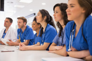 Nurses standing at a nurses station
